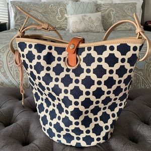 Spartina bucket bag with two interior pockets and one zipper pocket.